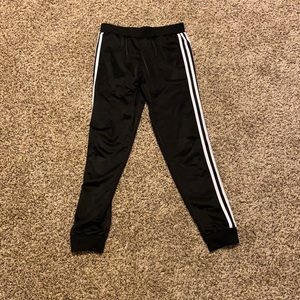Black and white adidas pants
